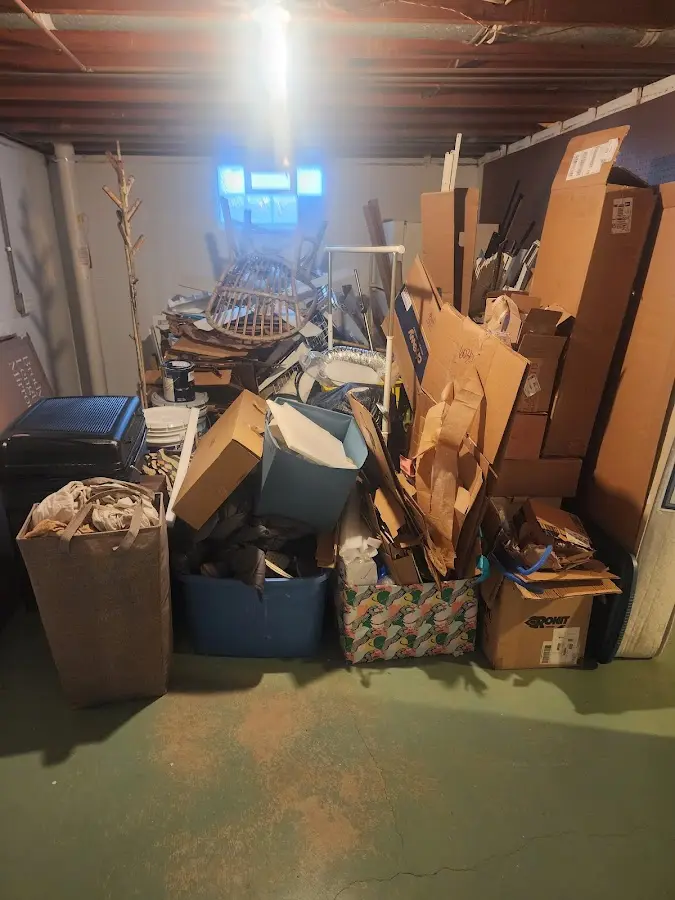 Roll-off dumpster container at job site for Roll Off Dumpster Rental in Kewanee